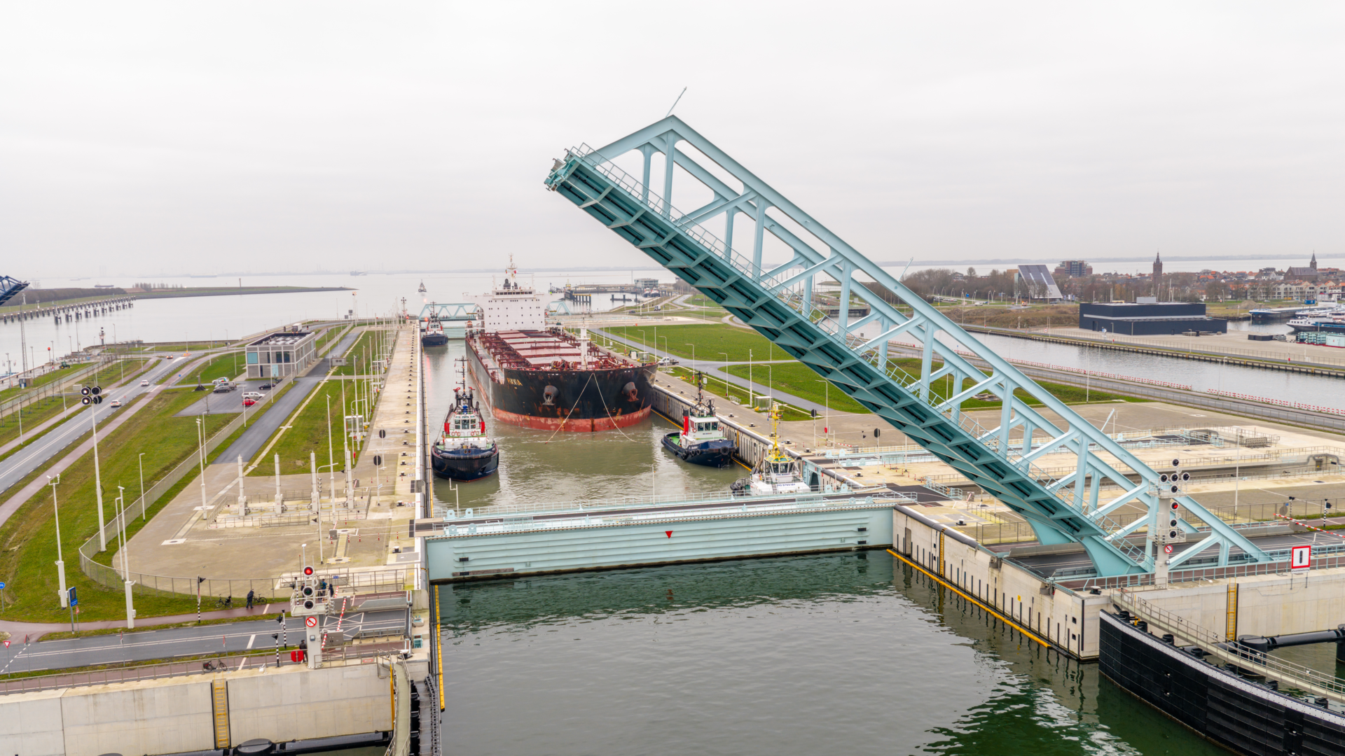 Photo of the PIAVIA ship in the New Terneuzen Lock during the wider ship trial voyage to ArcelorMittal Ghent.