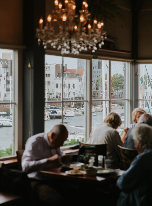 Picture of people at a restaurant near the Vlissingen sub-area of North Sea Port.