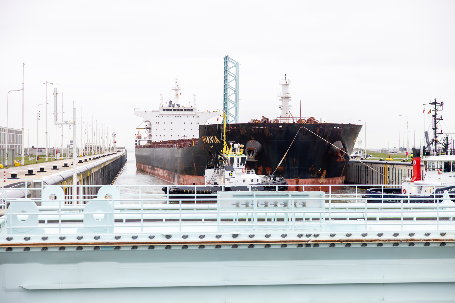 Photo of the PIAVIA ship in the New Terneuzen Lock during the wider ship trial voyage to ArcelorMittal Ghent.