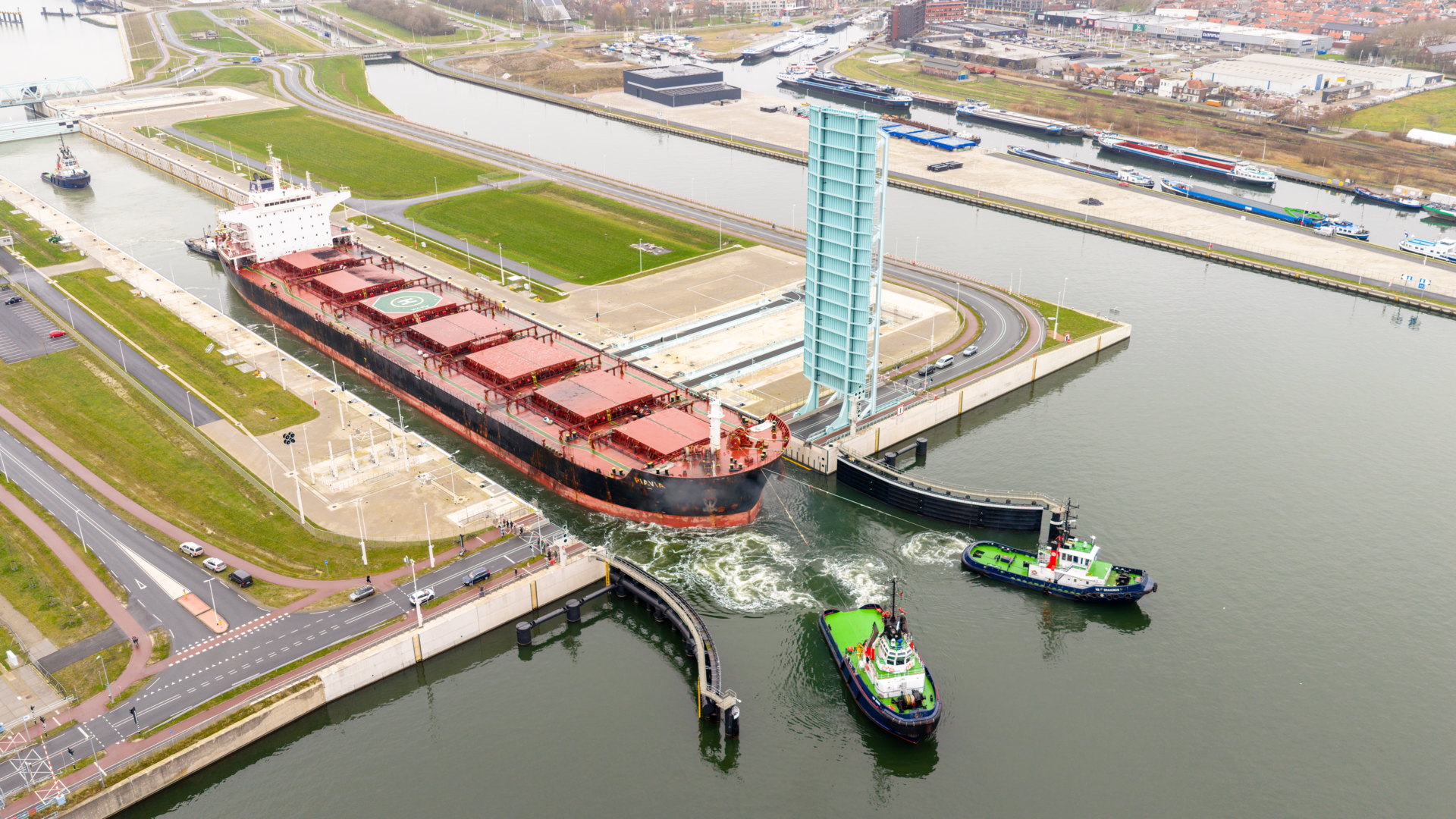 Photo of the PIAVIA ship in the New Terneuzen Lock during the wider ship trial voyage to ArcelorMittal Ghent.