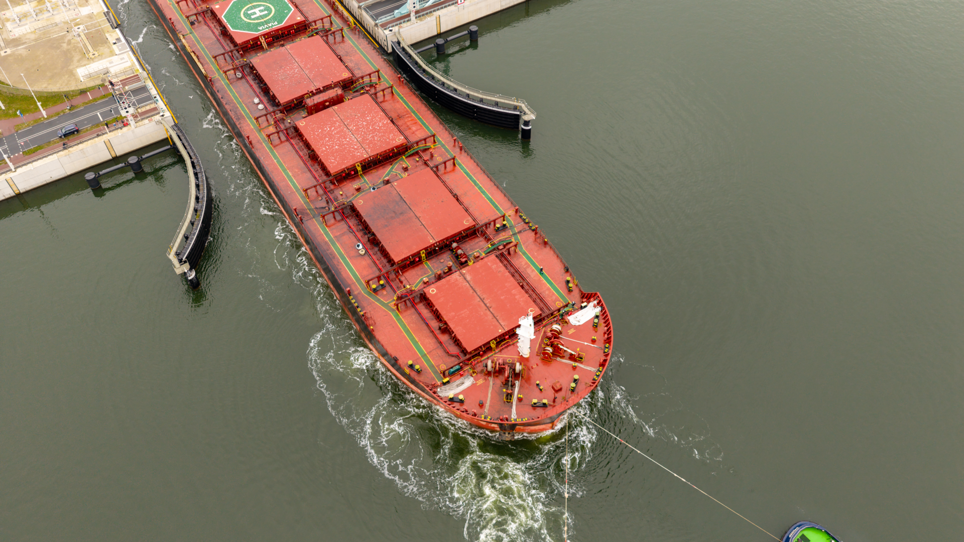 Photo of the PIAVIA ship in the New Terneuzen Lock during the wider ship trial voyage to ArcelorMittal Ghent.