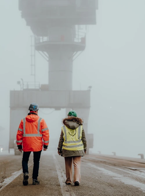 Picture of two people on the quay at Euroports Terminals in North Sea Port’s Ghent sub-area.