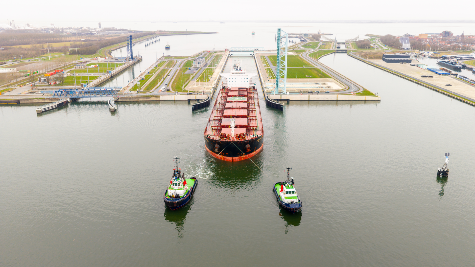 Photo of the PIAVIA ship in the New Terneuzen Lock during the wider ship trial voyage to ArcelorMittal Ghent.
